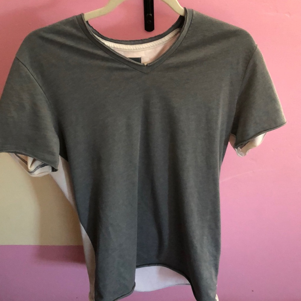 grey and white shirt